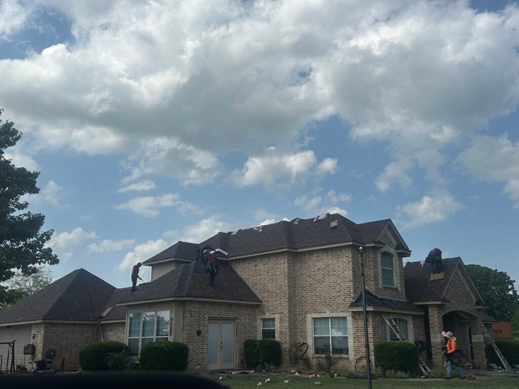 Newly installed asphalt shingle roof on a home in East Texas